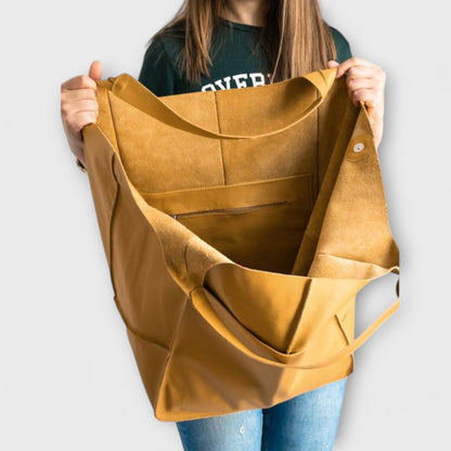 Emmi | Borsa a spalla da donna con formato grande e design morbido