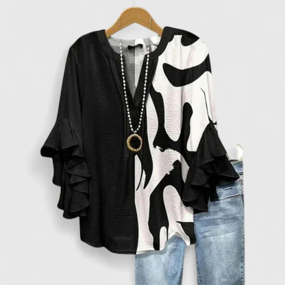 Nadine | Women's top with floral pattern and ruffled sleeves