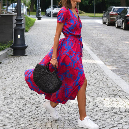Greta | Elegantes Midikleid mit Punkten und Wickeloptik